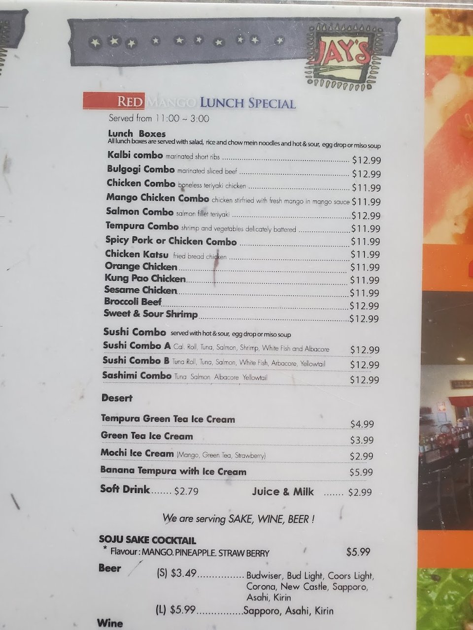 Close view of a restaurant menu layout.